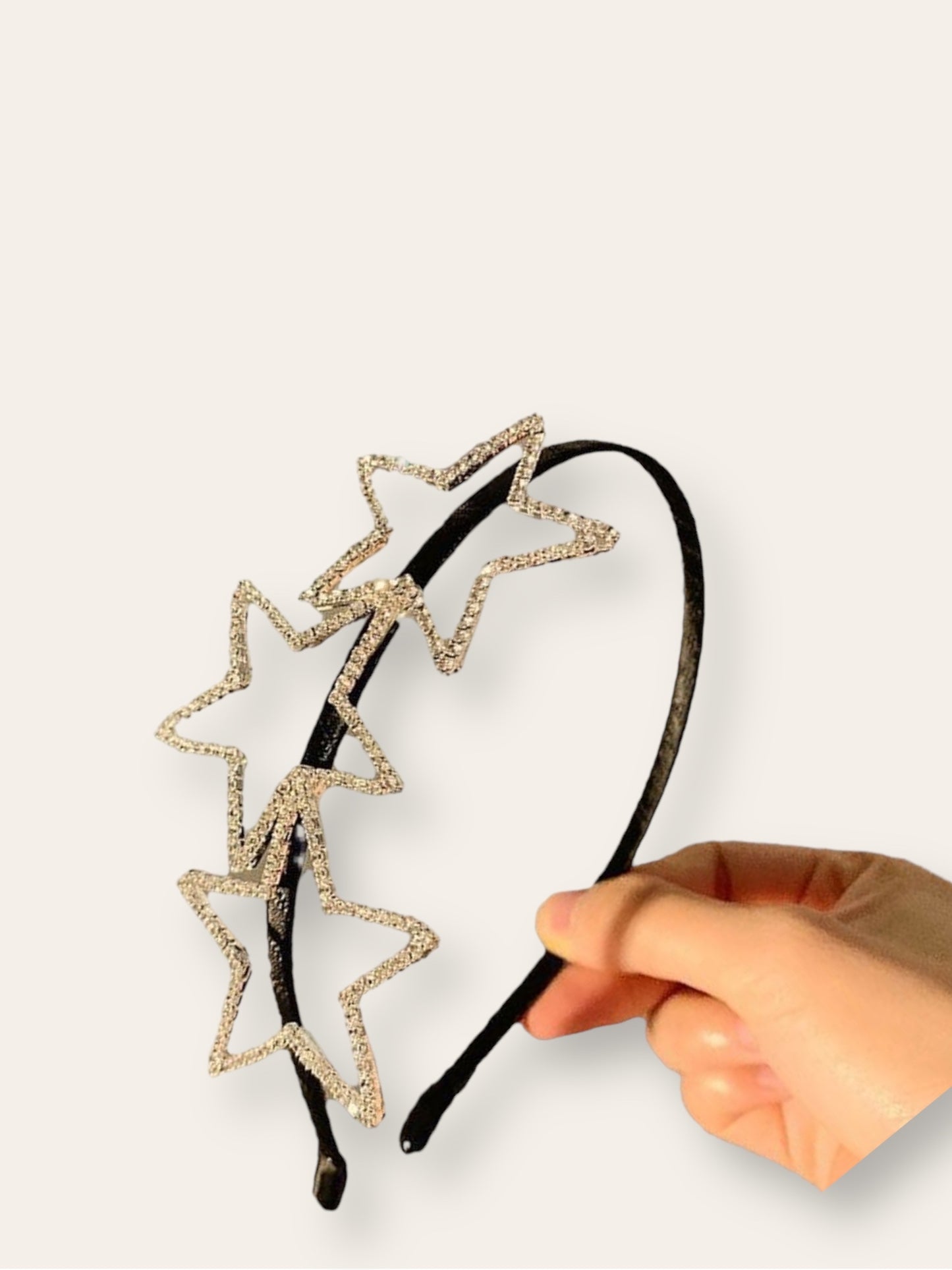 Diadema Negra con estrellas con piedras